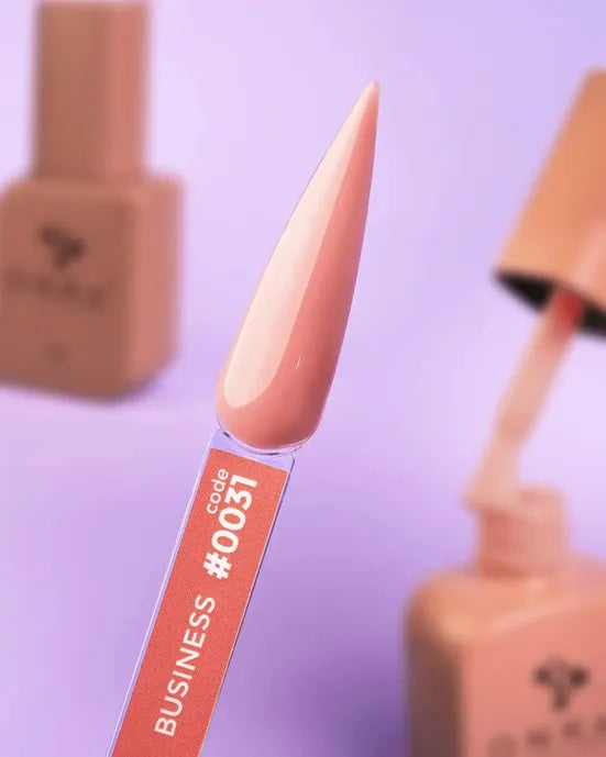 Nude pink rubber base gel polish swatch with code 0031 for manicure on lilac background