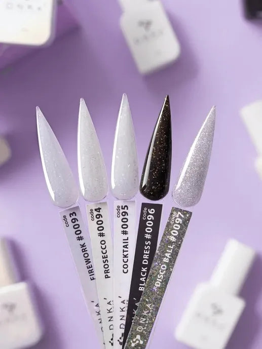 Five nail gel color swatches with glitter finish on labeled sticks, purple background