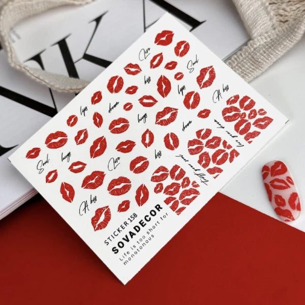 Red lips nail art stickers sheet with lipstick print manicure design on white background