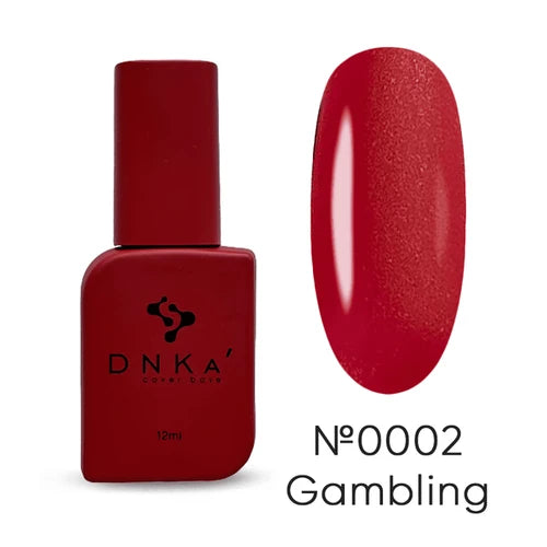 Red DNKA nail polish bottle and color swatch on a white background