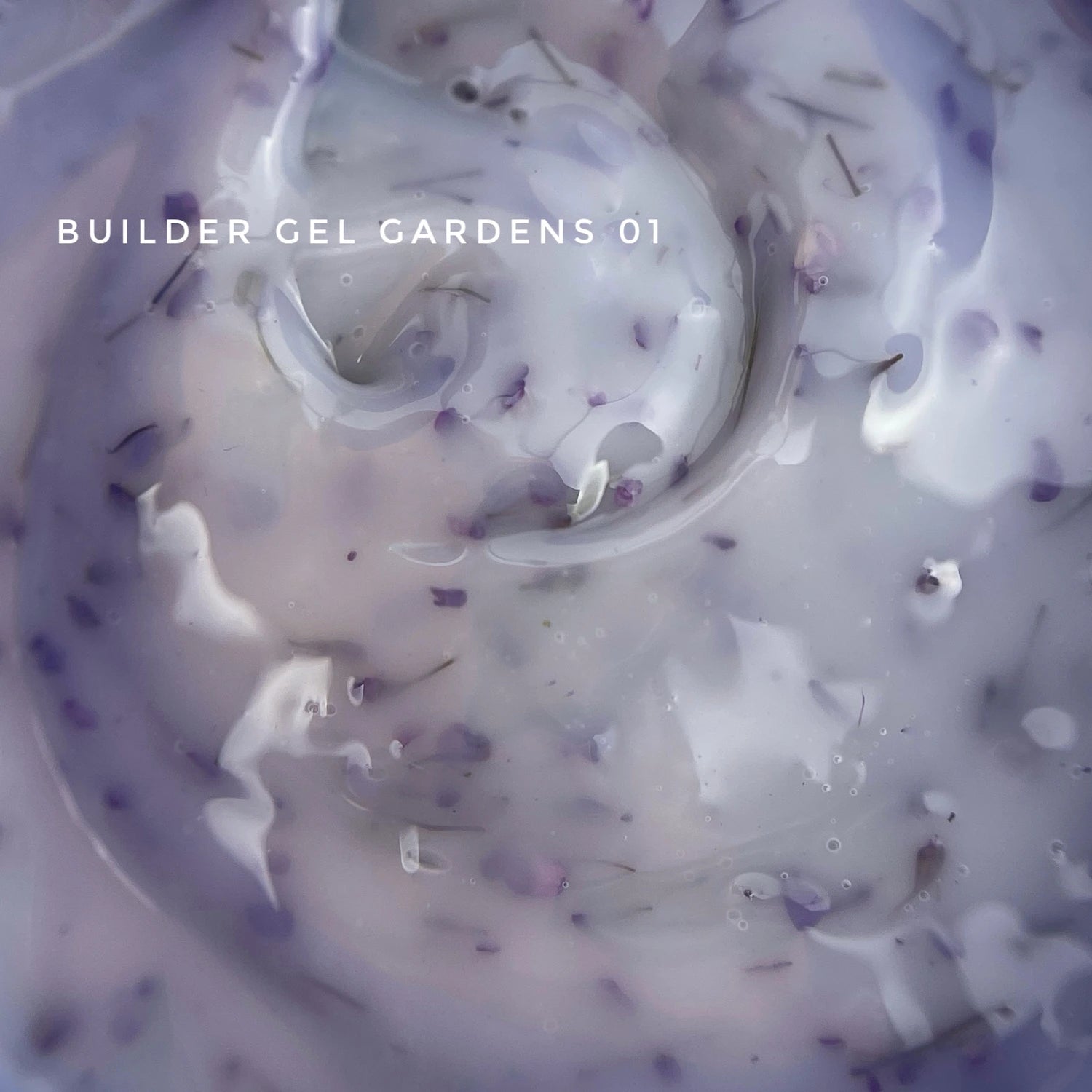 Swirl of pastel builder gel with purple and lilac accents for nail art and manicures