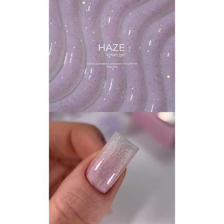 Light pink UV gel nail polish with silver glitter, glossy finish on manicured nail