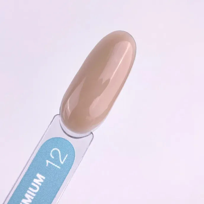 Beige nude gel nail polish color sample on nail display stick, labeled number 12.
