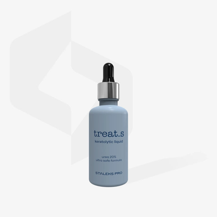 Blue bottle of Staleks Pro treat.s keratolytic liquid with dropper for nail care