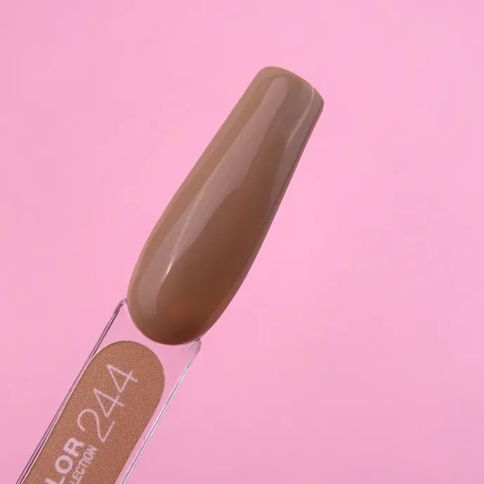 Brown nude gel nail polish swatch on display stick against pink background