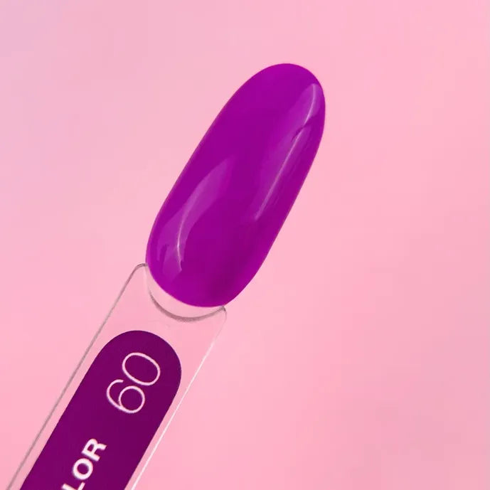 Purple gel nail polish swatch on clear sample stick, pink background, shade 60