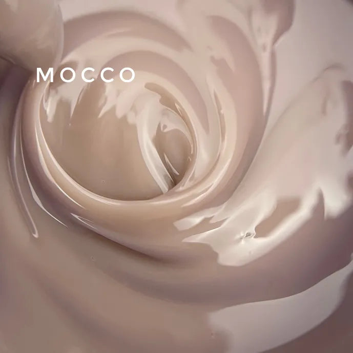 Swirl of creamy nude UV nail gel, glossy manicure product texture close-up