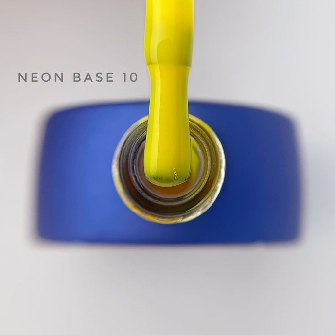 Yellow neon gel nail polish brush over open blue polish bottle, labeled Neon Base 10