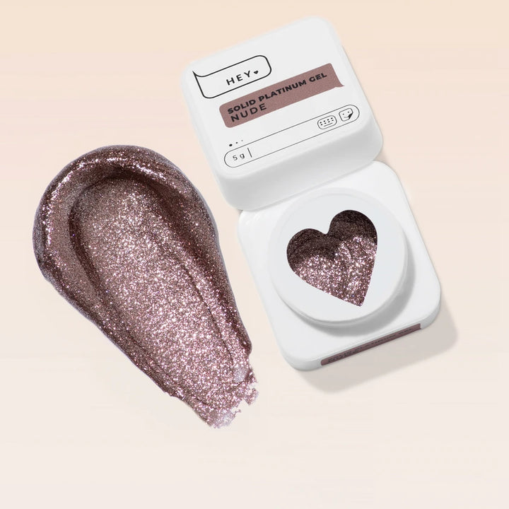 Rose nude glitter solid platinum gel nail polish in open container with heart-shaped window