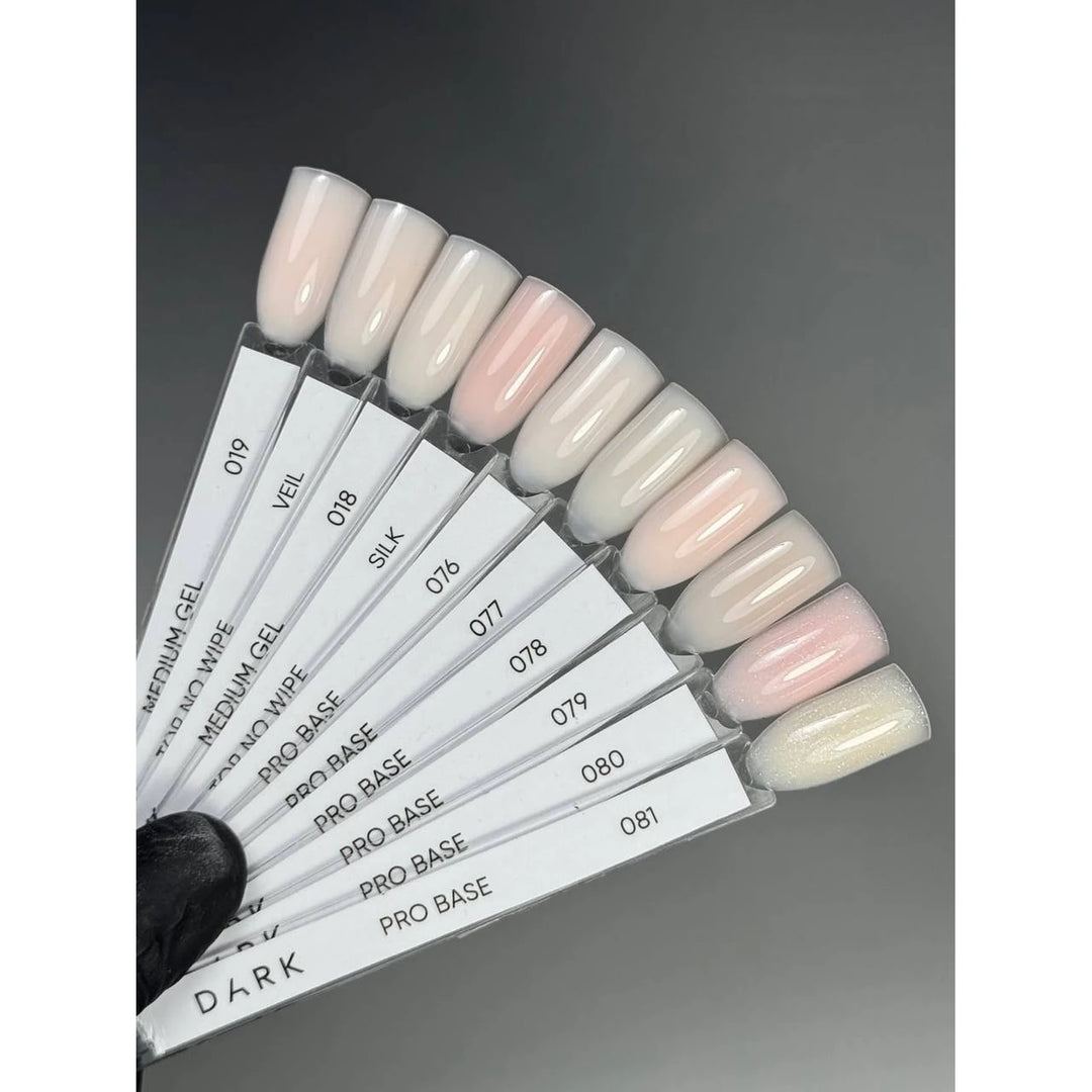 Nail color palette with nine neutral UV gel polish samples for manicure display