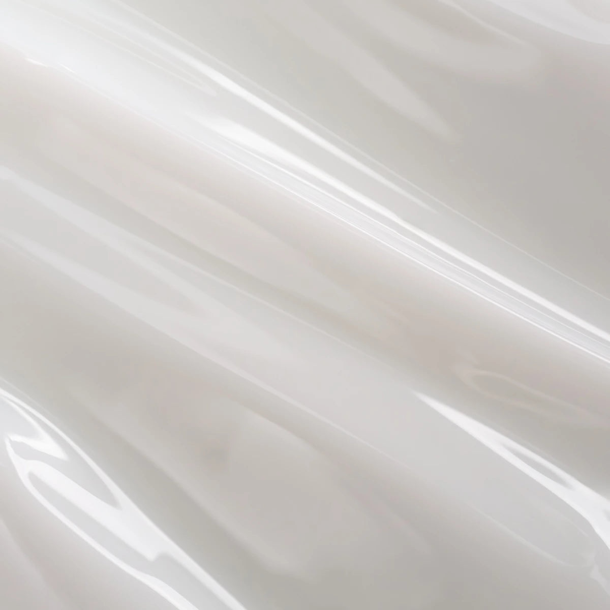 Glossy white UV gel texture for nail art and manicure