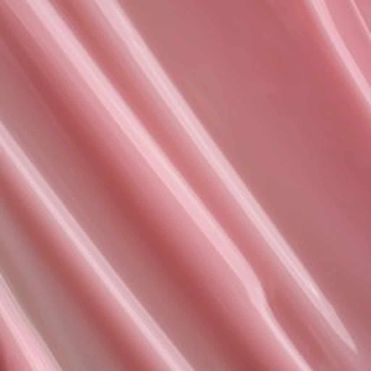 Glossy pink gel nail polish texture with smooth, flowing lines, manicure product