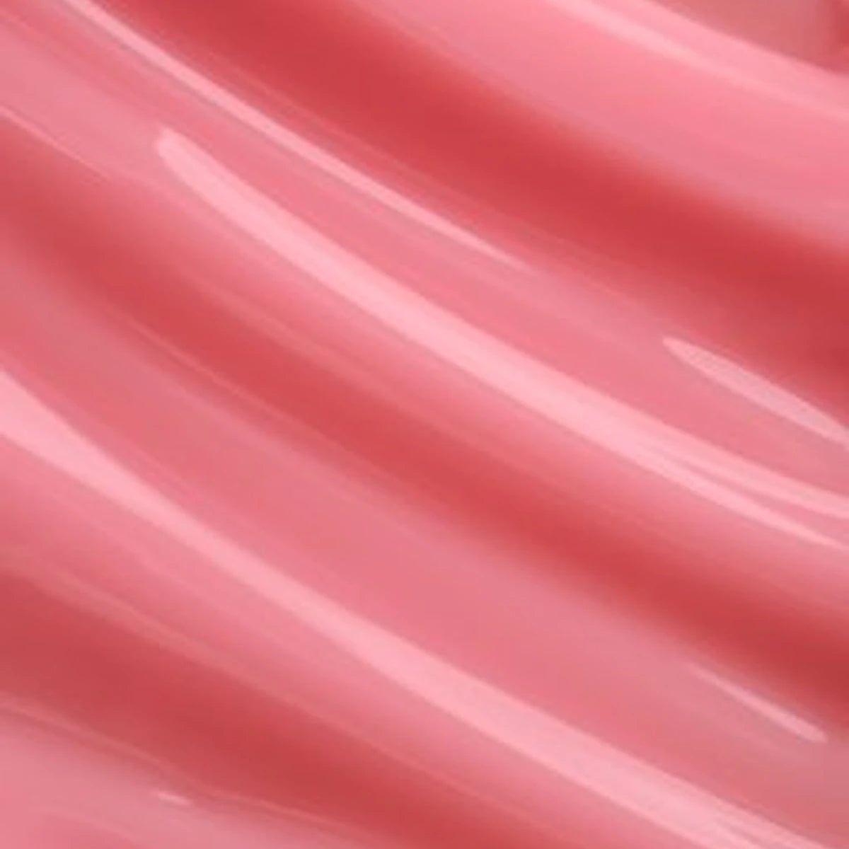 Glossy pink gel polish texture, perfect for professional manicure and nail art.