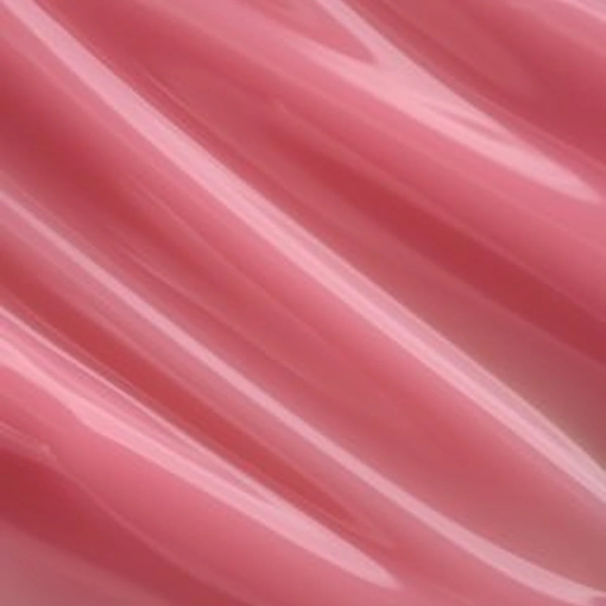 Glossy pink gel nail polish texture, close-up for manicure nail art