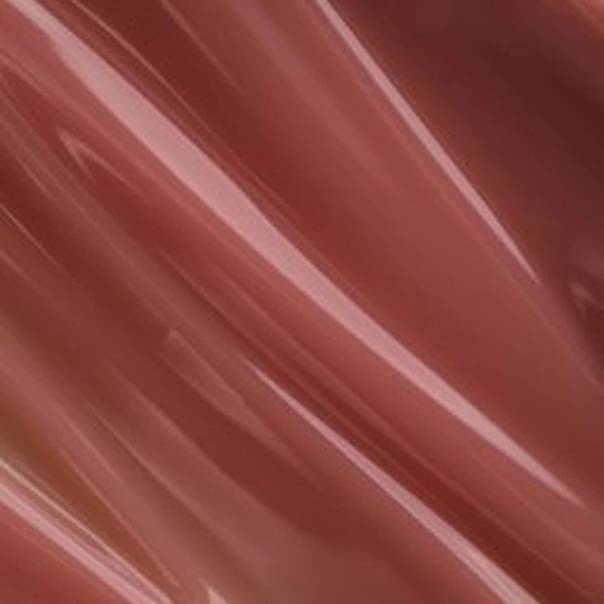 Glossy nude gel nail polish texture with smooth, rich brown-pink color