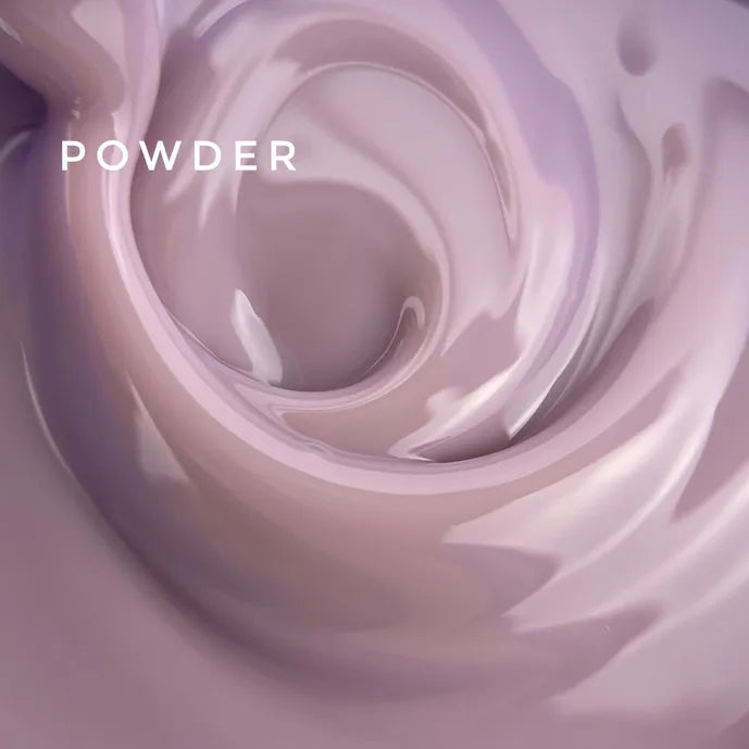 Swirl of light purple nail powder for professional manicure or pedicure
