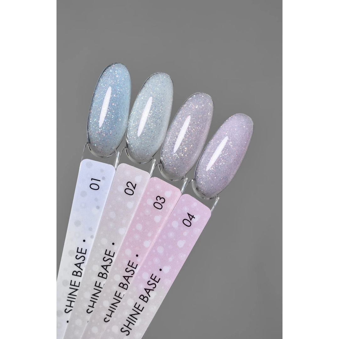 Shimmery pastel gel nail polish color swatches labeled Shine Base 01 to 04 on gray background.