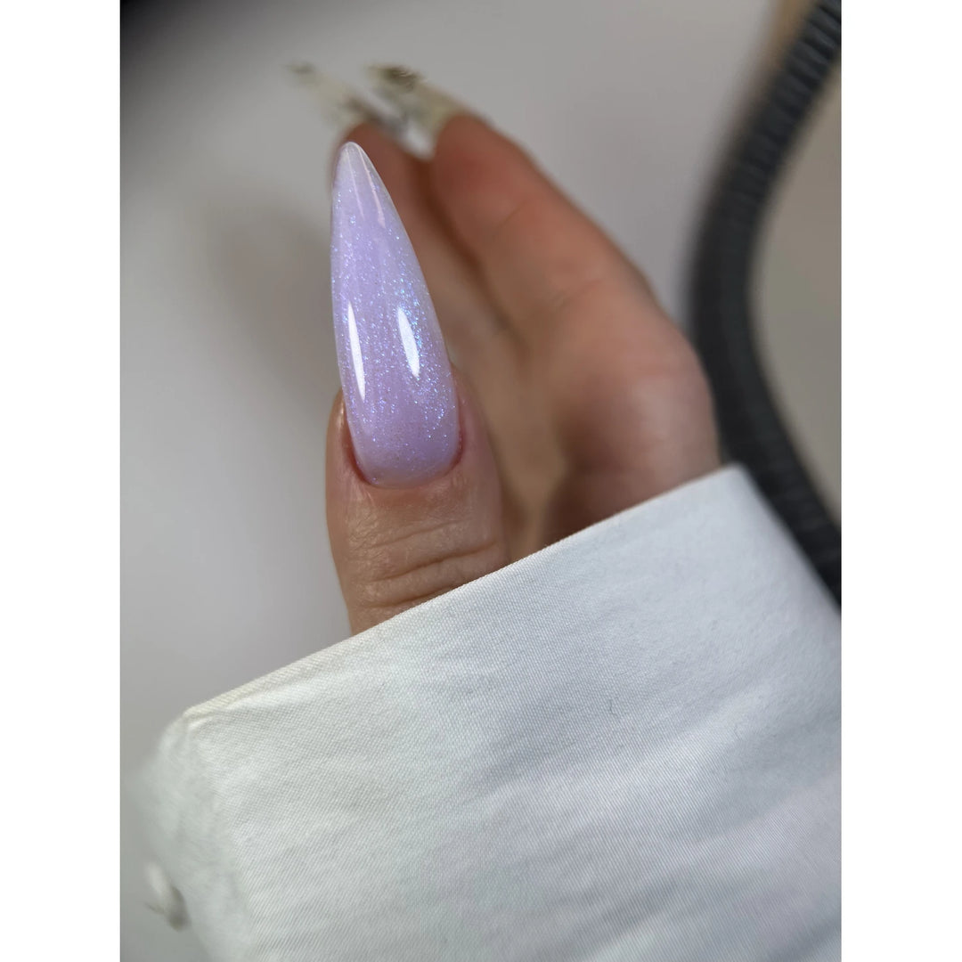 Long almond-shaped nail with glossy, shimmering lilac UV gel polish manicure