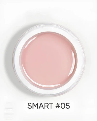 Open jar of soft pink UV gel for nails labeled SMART #05, ideal for manicure and nail art.