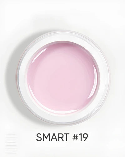 Open jar of pink UV nail gel labeled SMART #19 for manicure and nail art.
