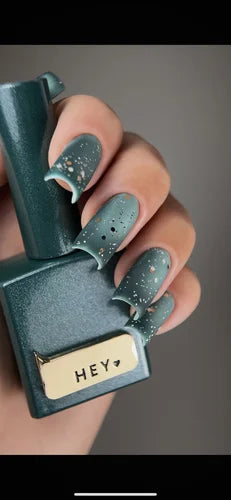 Teal nail polish bottle with &