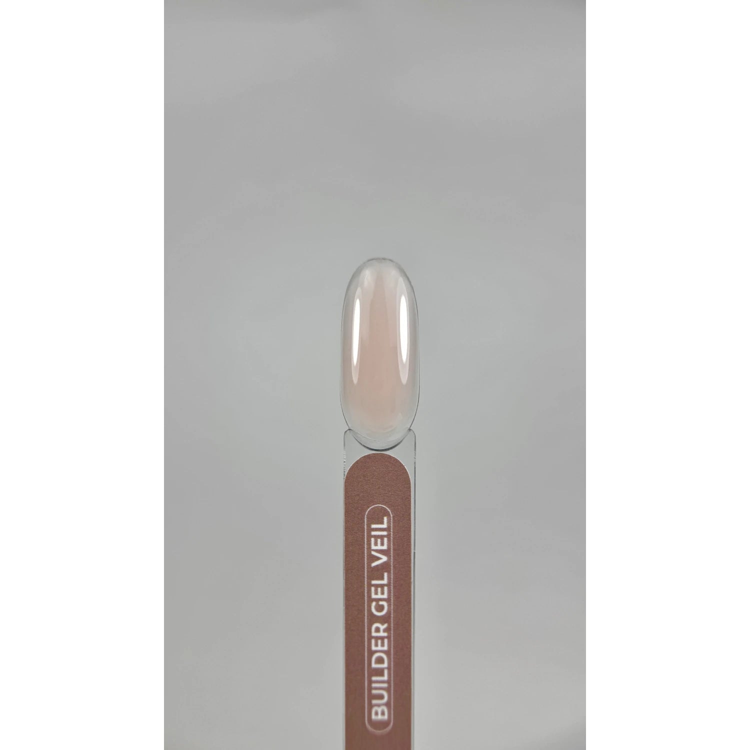 Builder gel veil sample swatch with nude pink translucent finish for manicure nails