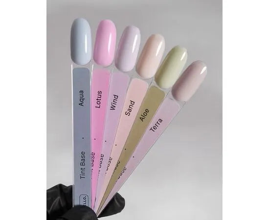 Set of pastel gel polish color swatches for manicure, labeled Aqua, Lotus, Wind, Sand, Aloe, Terra
